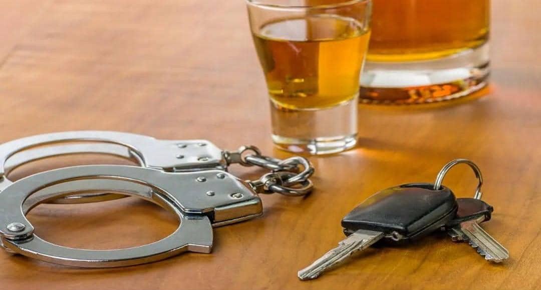 Drunk motorist jailed, banned for life