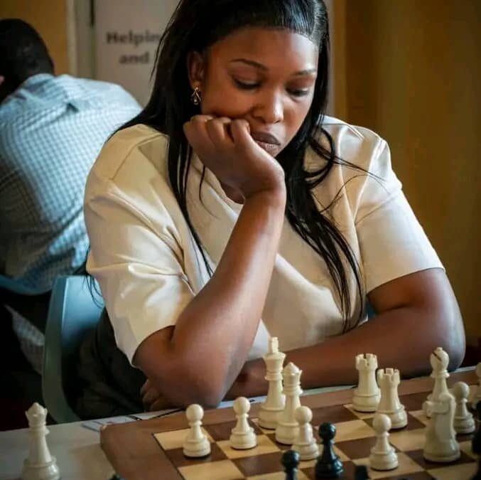 Female teacher competes in international chess tourney